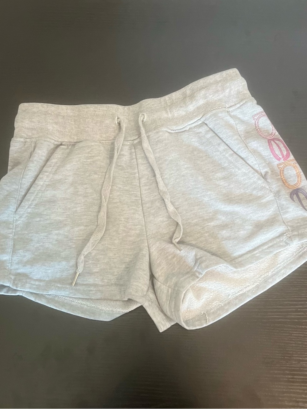 bebe Light Gray Athletic Drawstring Shorts with Multicolor Logo 🐝
